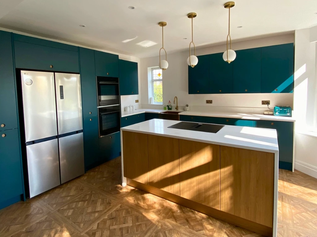 Modern kitchen renovation in Manchester with Porter Portal doors and oak backplate