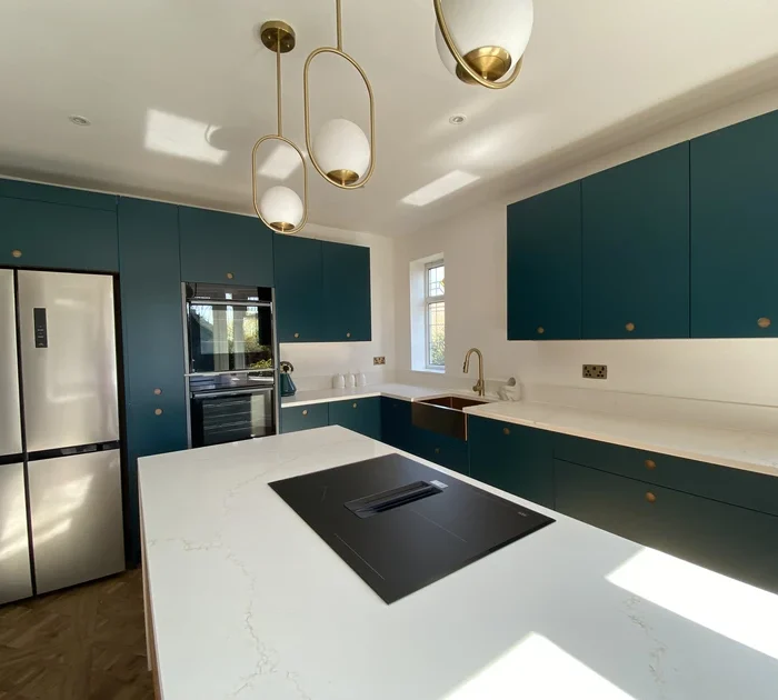 Modern kitchen renovation in Manchester with Porter Portal doors and oak backplate